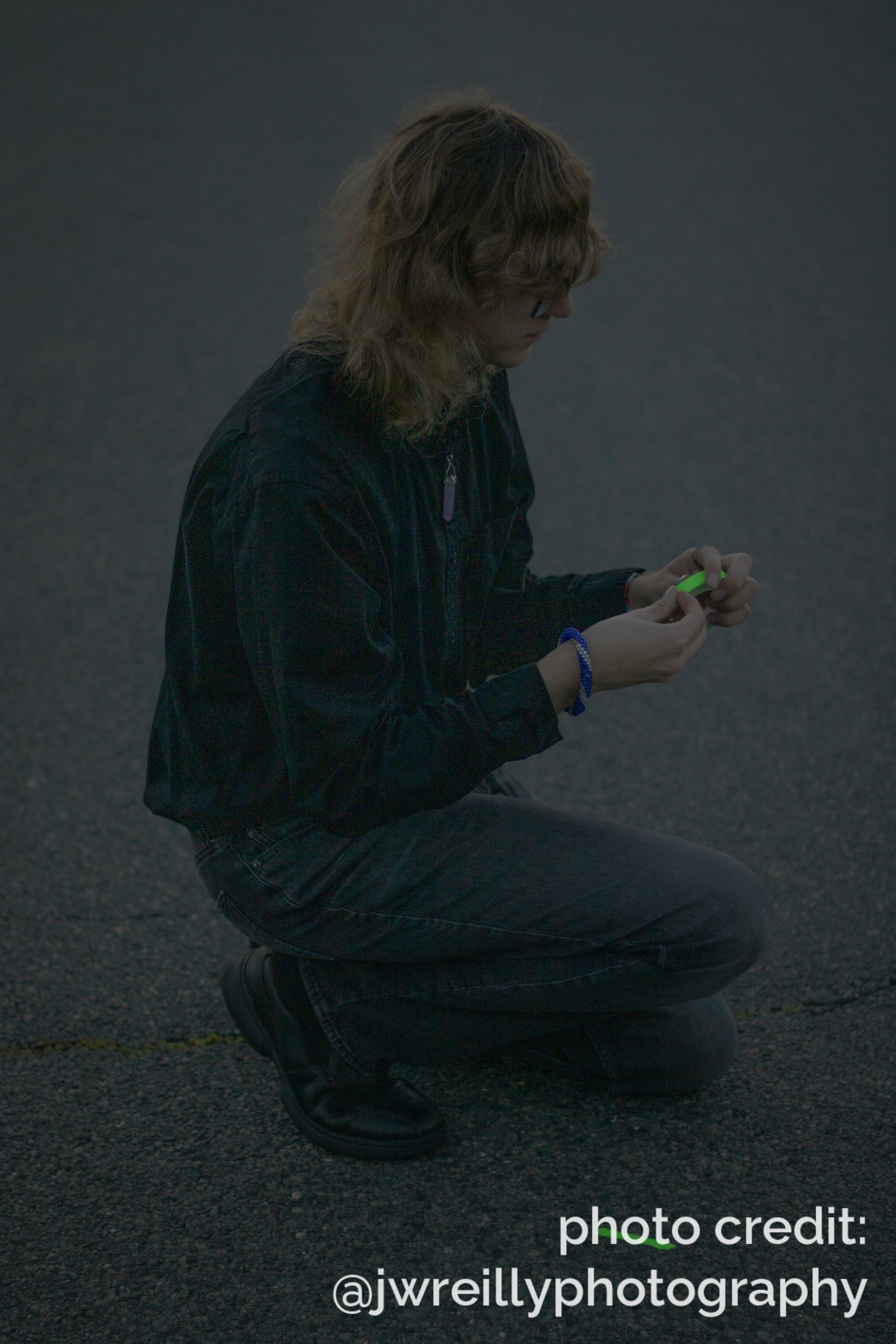 Dave places a spike on a black floor