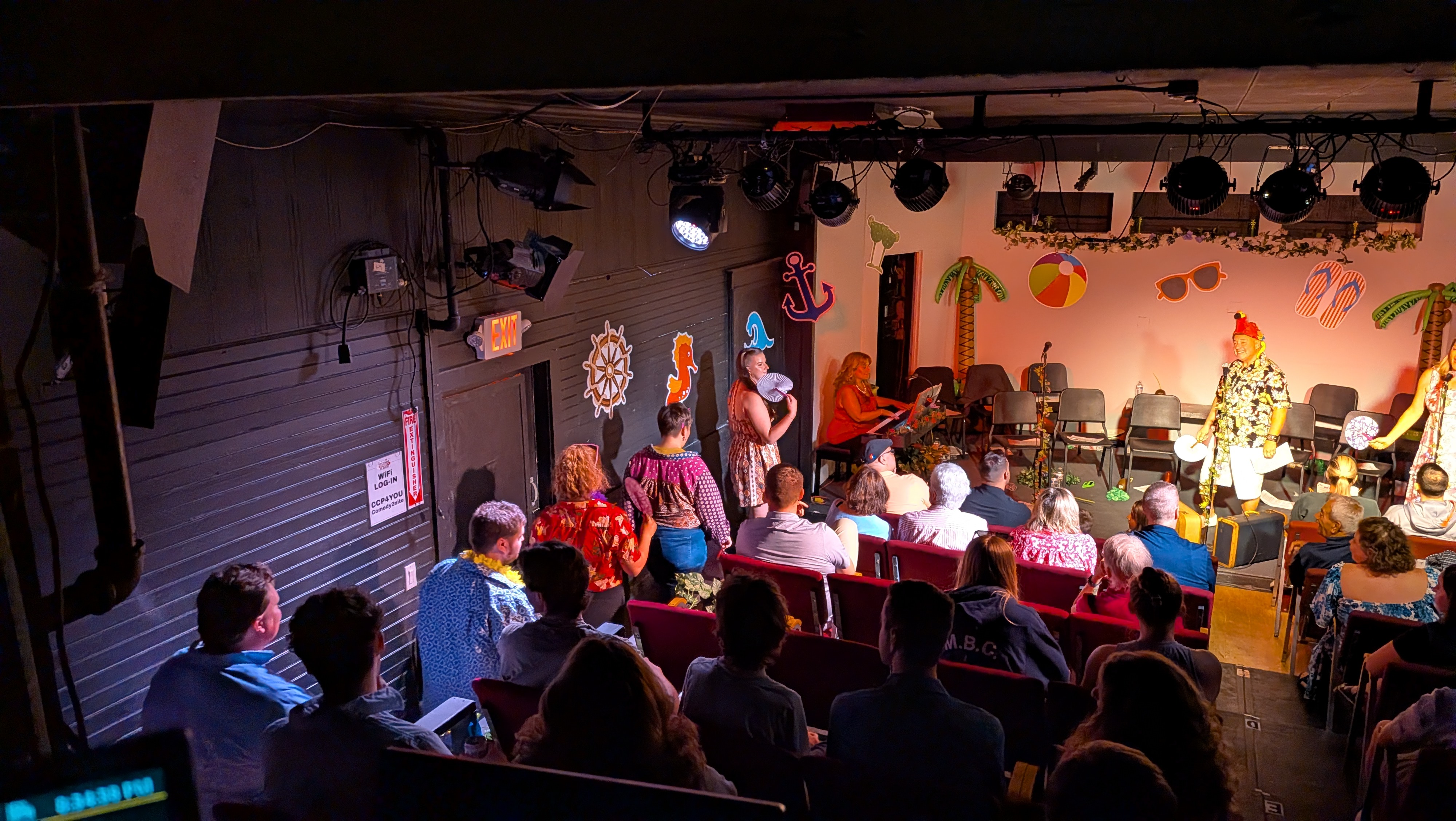 The cast of the cabaret enters from the rear of HL. They are lit by moving LED lights, which move back to the stage once the last singer has reached the stage.