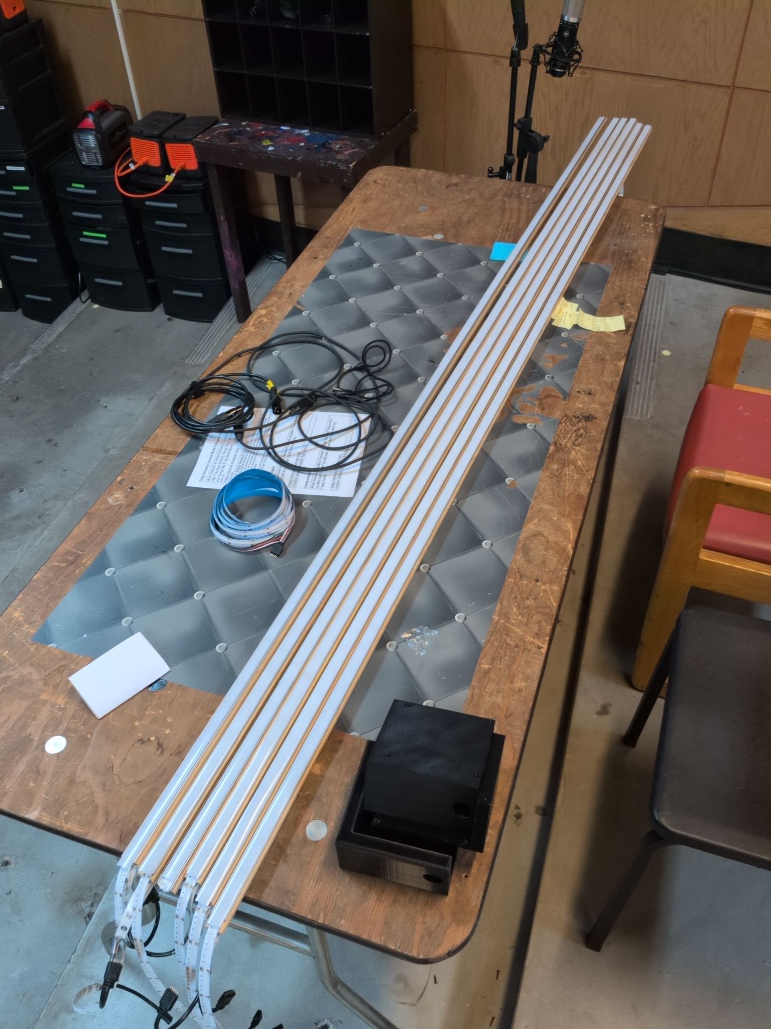 LEDs inside LED raceway, layed out on a table.